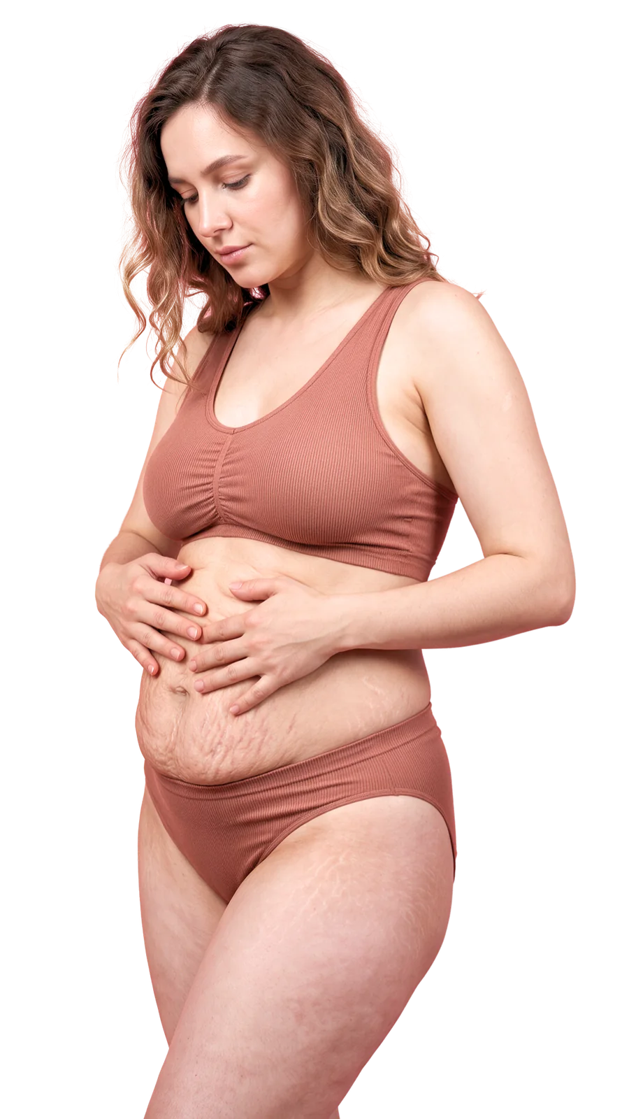 Mulher com as mãos na barriga, olhando para baixo